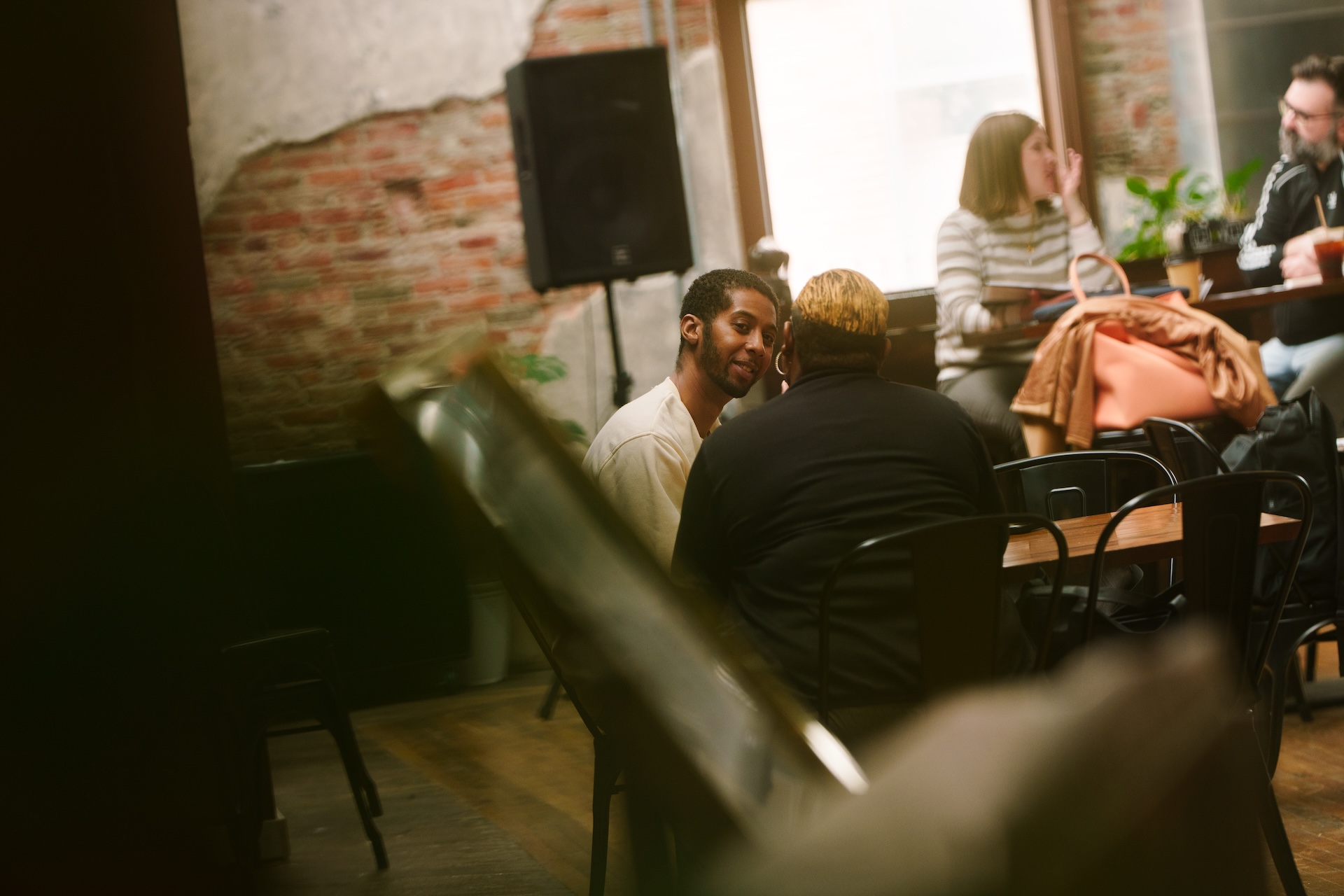 Guests connecting at Earth Coffeehouse